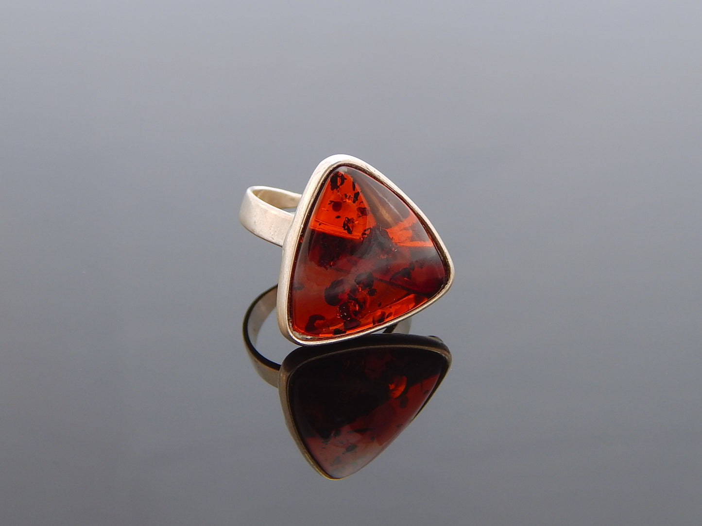 Natural Baltic Cherry Amber Trillion Cut Adjustable Ring in 925 Sterling Silver