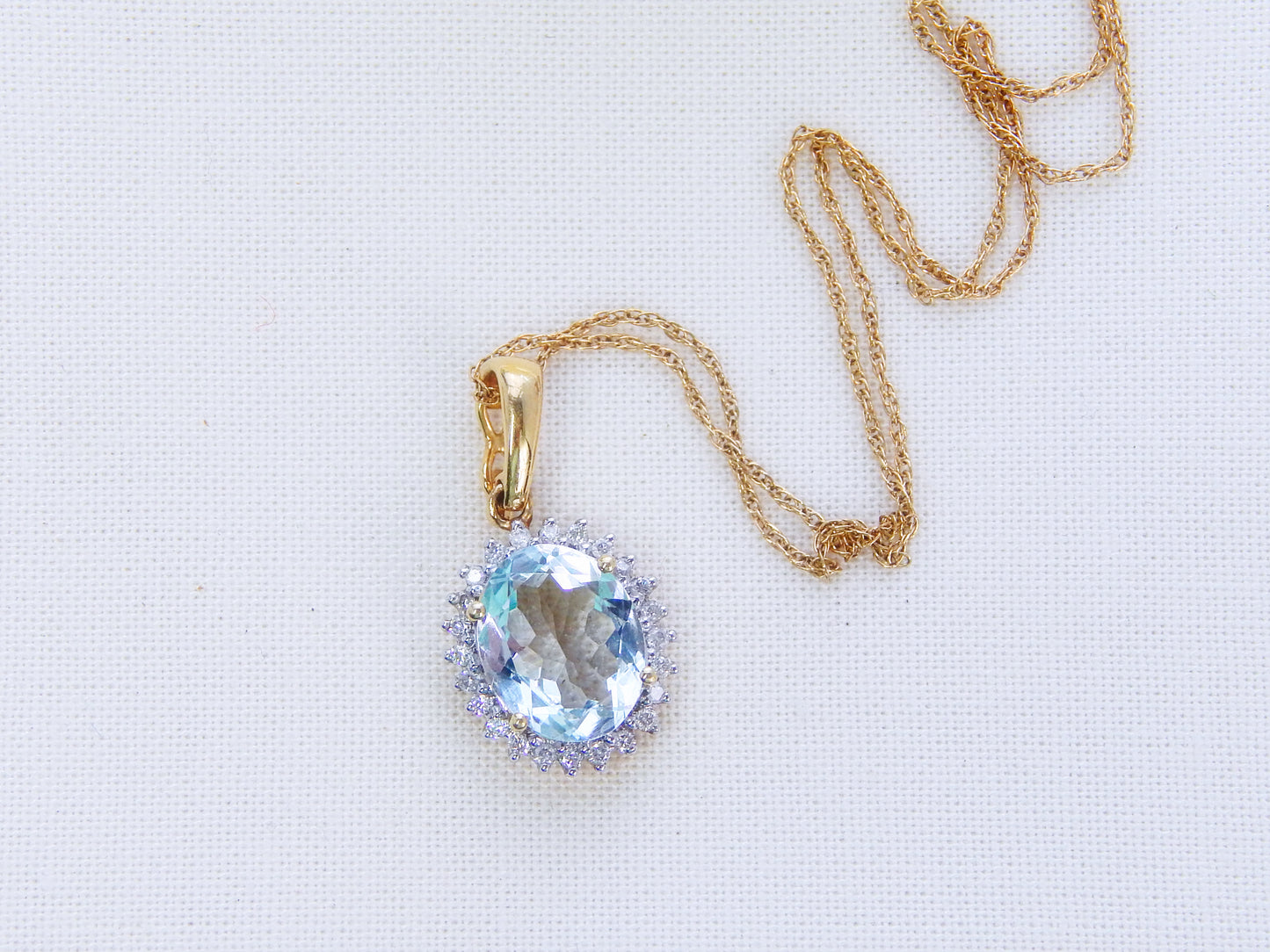 14K Yellow Gold Aquamarine Necklace in Diamond Halo